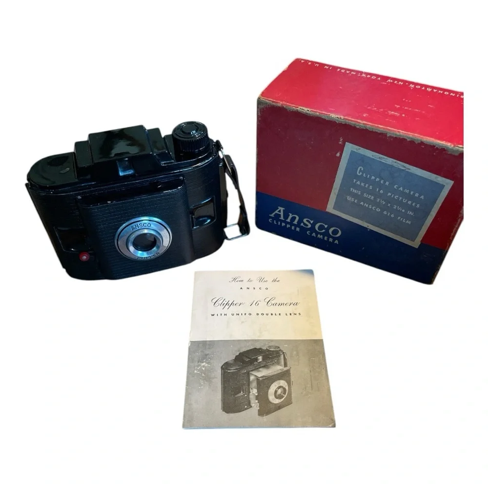 Black Film Photography Camera with Textured Body and Circular Lens UNTESTED